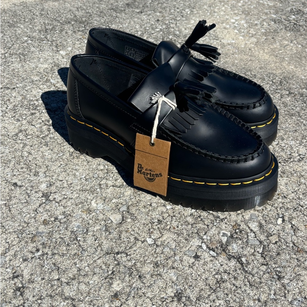 Dr. Martens Black Tassel Kiltie Platform Loafers with Yellow Stitching